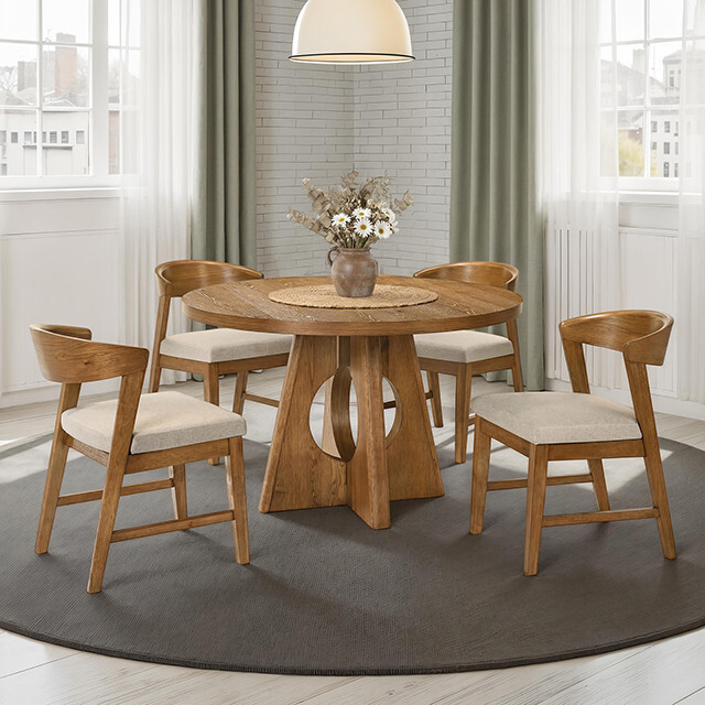 round dining room table set with four chairs